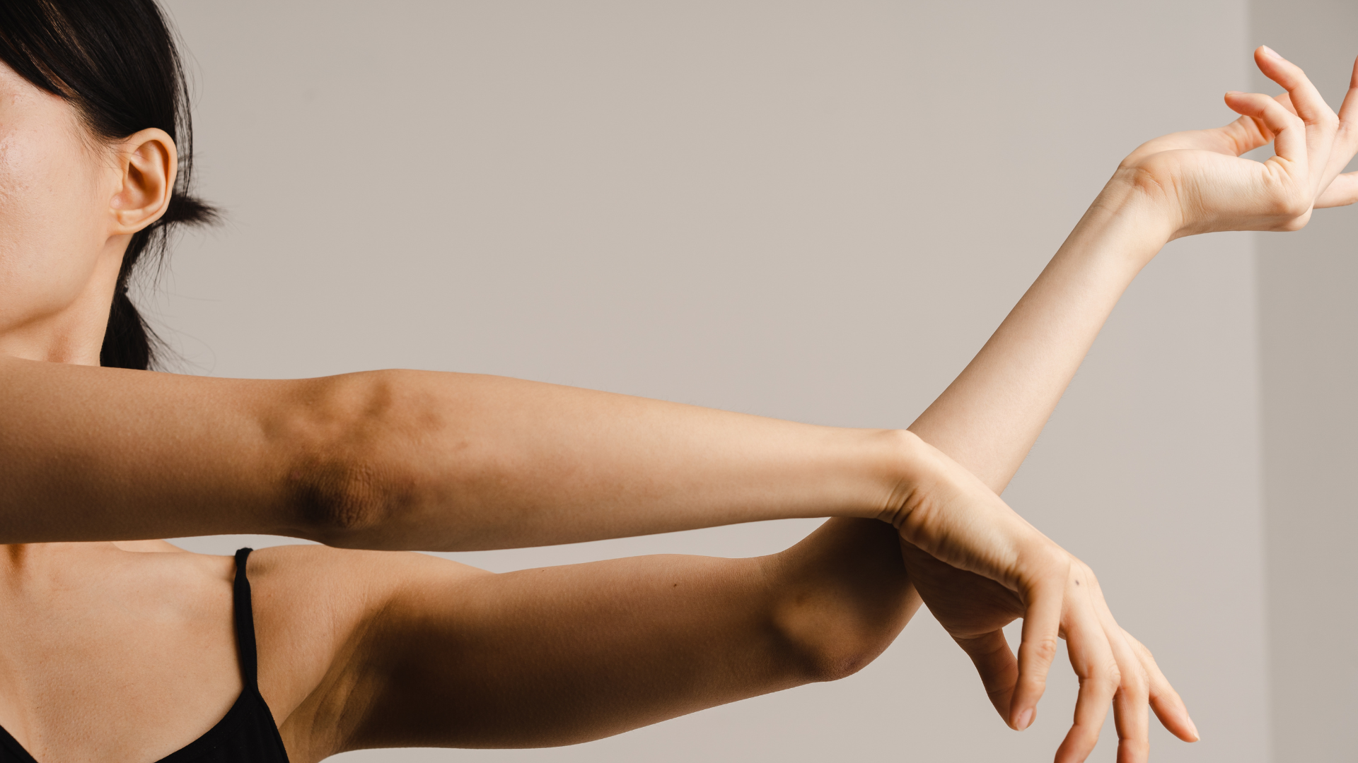 Woman stretching her arms and wrists